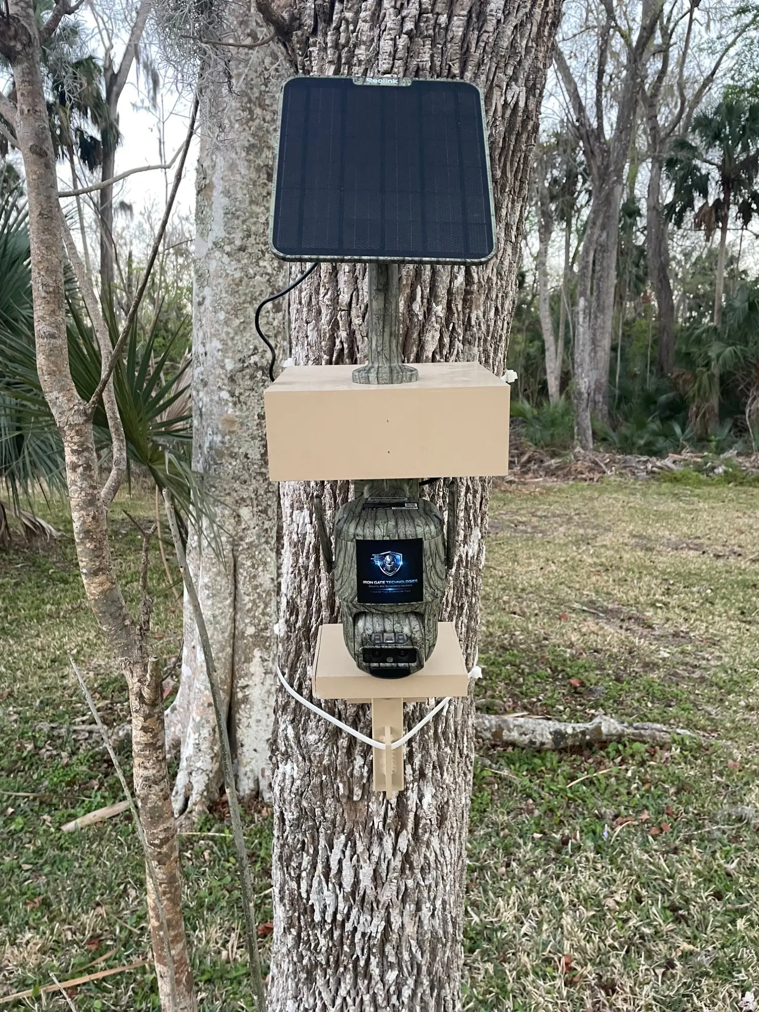 Hunting Solution autonomous wildlife surveillance platform mounted on tree with solar panel