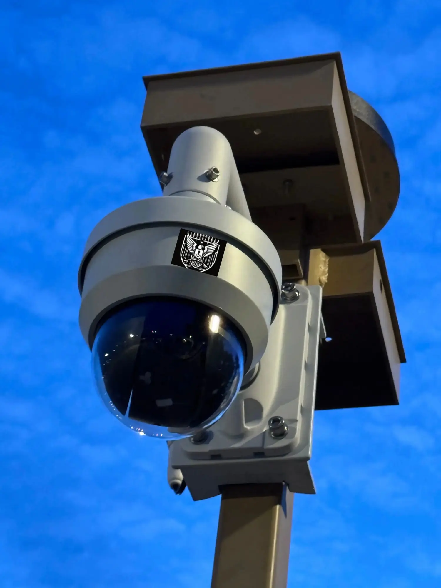 SecMod surveillance unit with camera array against blue sky
